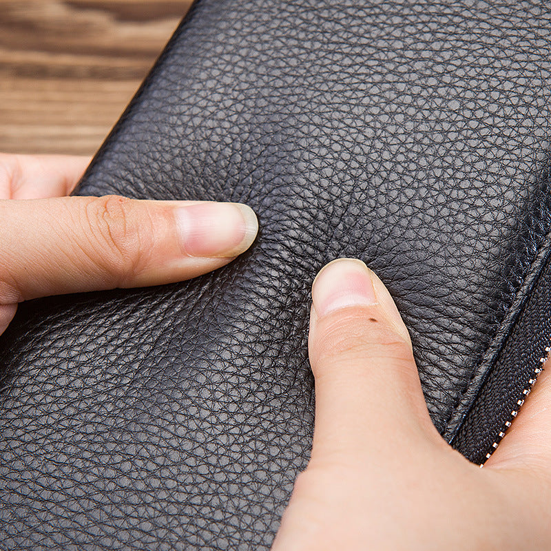 The First Layer Of Cowhide Coin Purse, Long Hand Holding Business Gifts