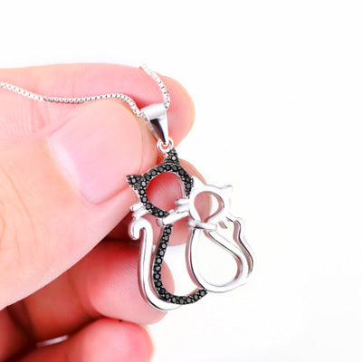 Black and white cat pendant necklace